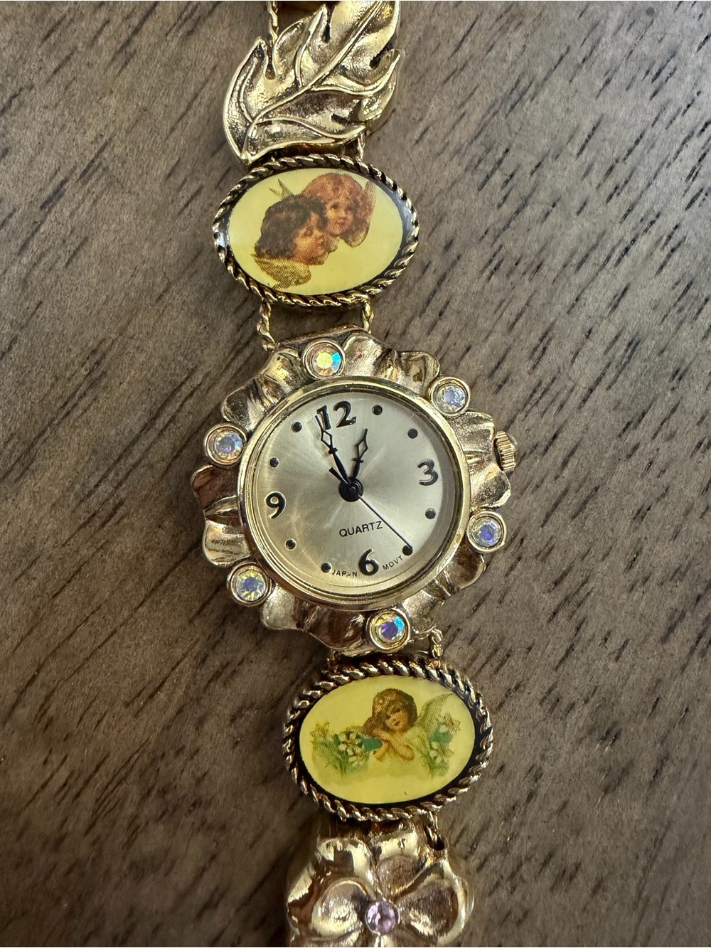 Vintage gold tone charm churub Women's Bracelet Watch working -